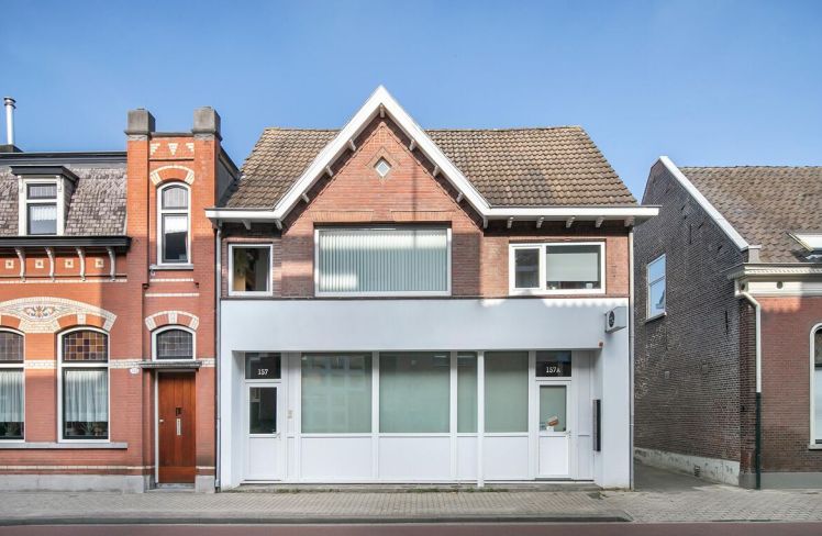 Hoe reageert een REIT op een hogere rente?